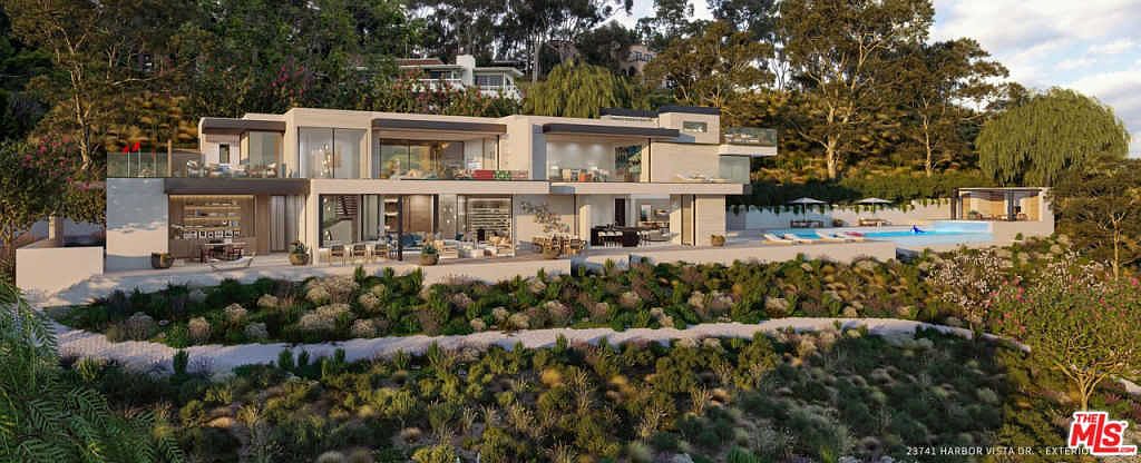 Twilight elevation of the proposed Doug Burdge estate at 23741 Harbor Vista Drive, Malibu, with the Pacific Ocean visible beyond