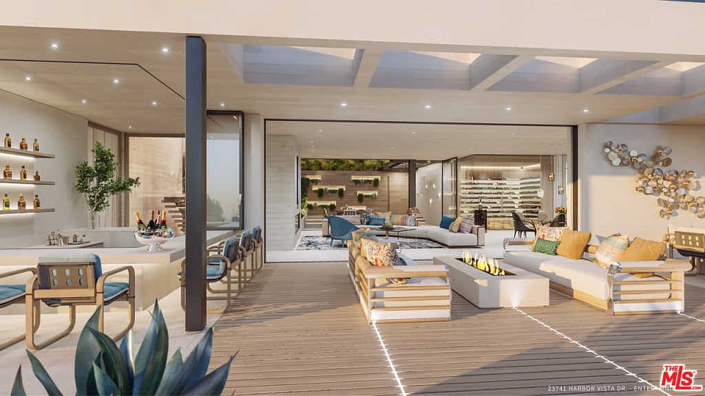 Outdoor terrace with built-in fire feature and seating