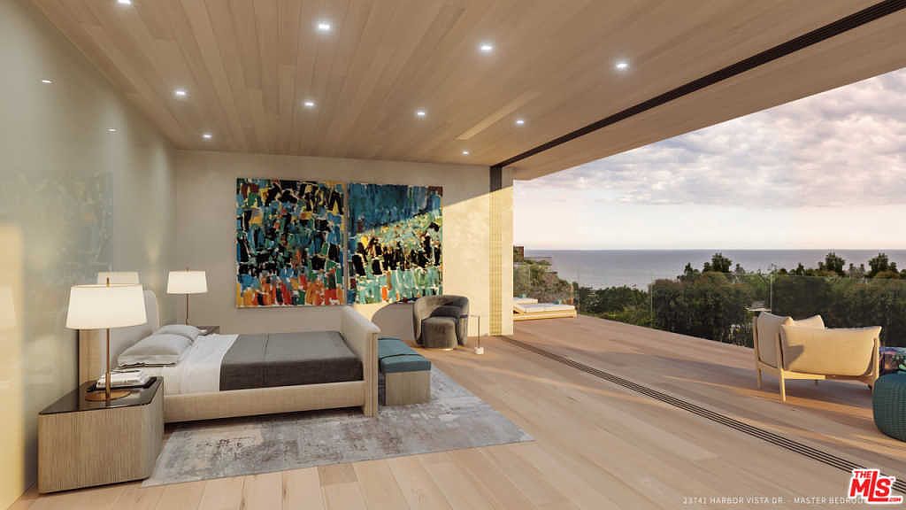 Primary bedroom with retractable wall opening to the Pacific